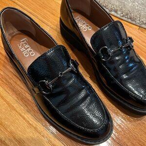 Franco Sarto Black Patten Leather Slip In shoe with rubber sole. Size 6.5